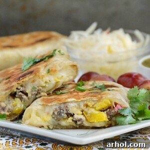 crispy salsa verde breakfast burritos with sausage eggs and peppers