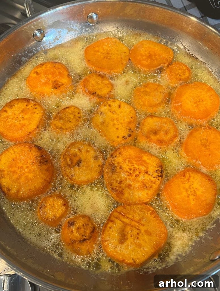 Slicing and cooking yams in butter and brown sugar in a skillet