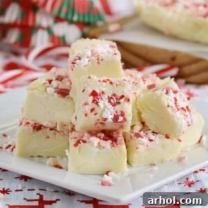 white chocolate peppermint fudge on white plate
