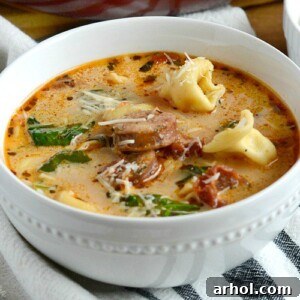 easy chicken sausage tortellini soup in bowl