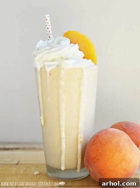 Copycat version of Chick-fil-A's peach milkshake in a frosted glass