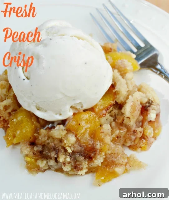 Warm peach crisp served with a scoop of vanilla ice cream
