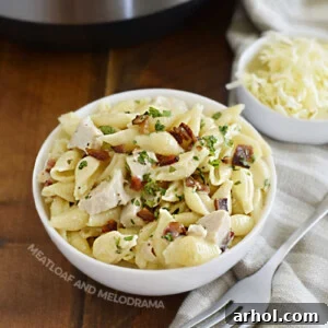 Creamy Instant Pot Chicken Bacon Ranch Pasta 2 instant pot creamy chicken bacon ranch pasta in bowl with parsley on top