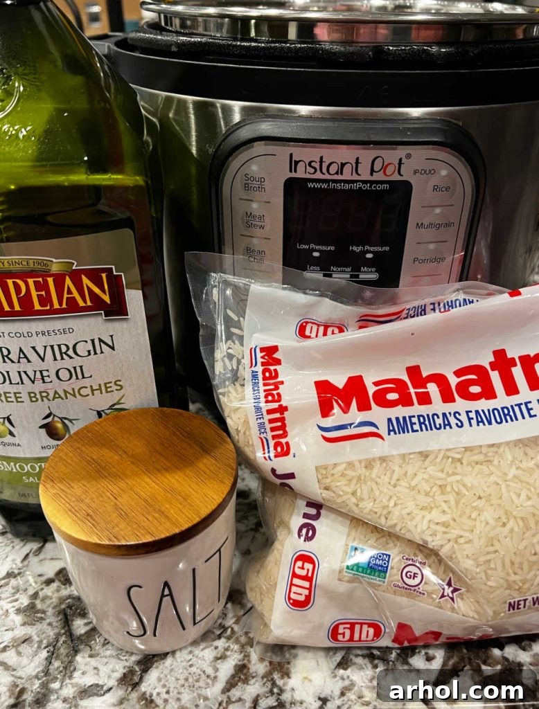 Essential ingredients: jasmine rice, olive oil, and sea salt, ready to be cooked in an Instant Pot pressure cooker.