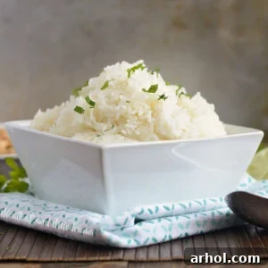 bowl of instant pot jasmine rice with parsley