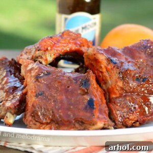 Instant Pot beer ribs with orange Valencia beer on a platter
