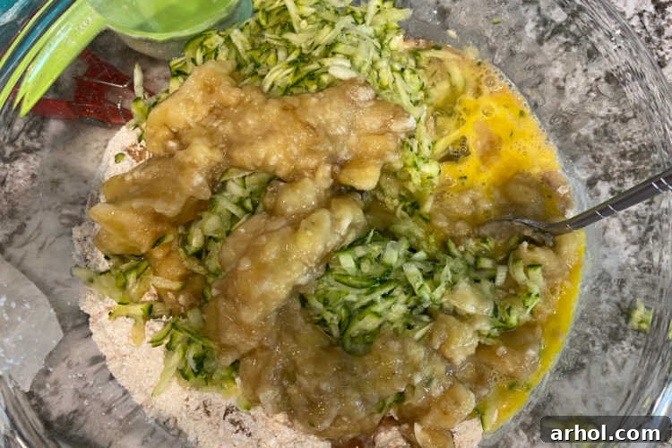 Well-mixed dry ingredients in a large mixing bowl, ready for the wet ingredients to be added.
