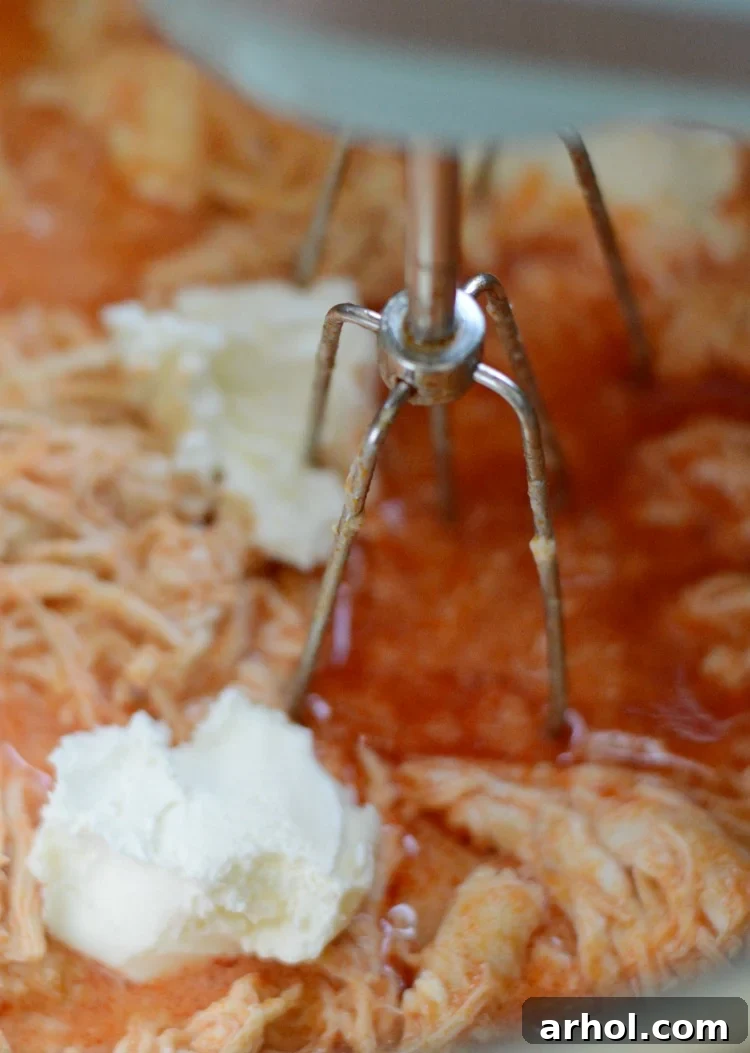 mix cream cheese with shredded instant pot buffalo chicken dip