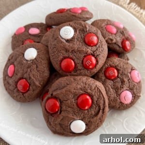 Fudgy chocolate cake mix cookies with colorful M&M candies, a delightful treat.