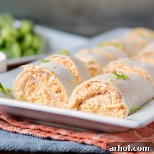 Instant Pot Buffalo chicken roll-ups on white platter