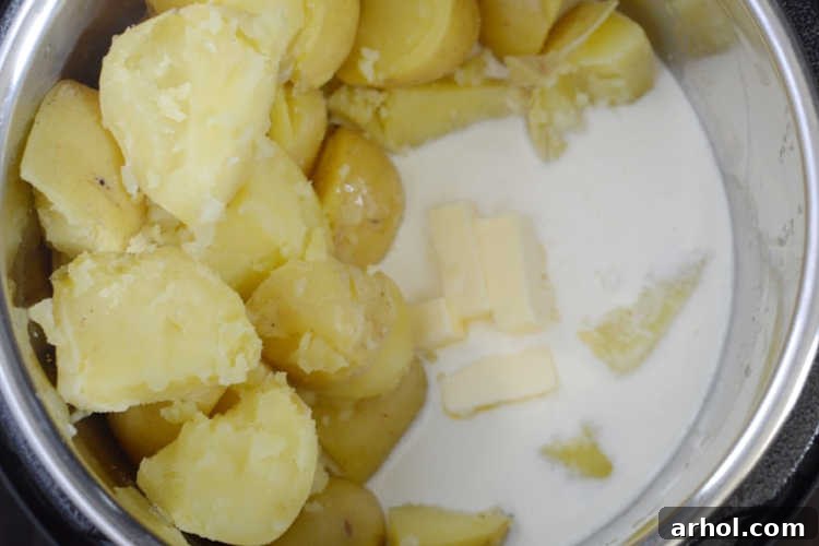 Cooked potatoes with heavy cream and butter in an Instant Pot