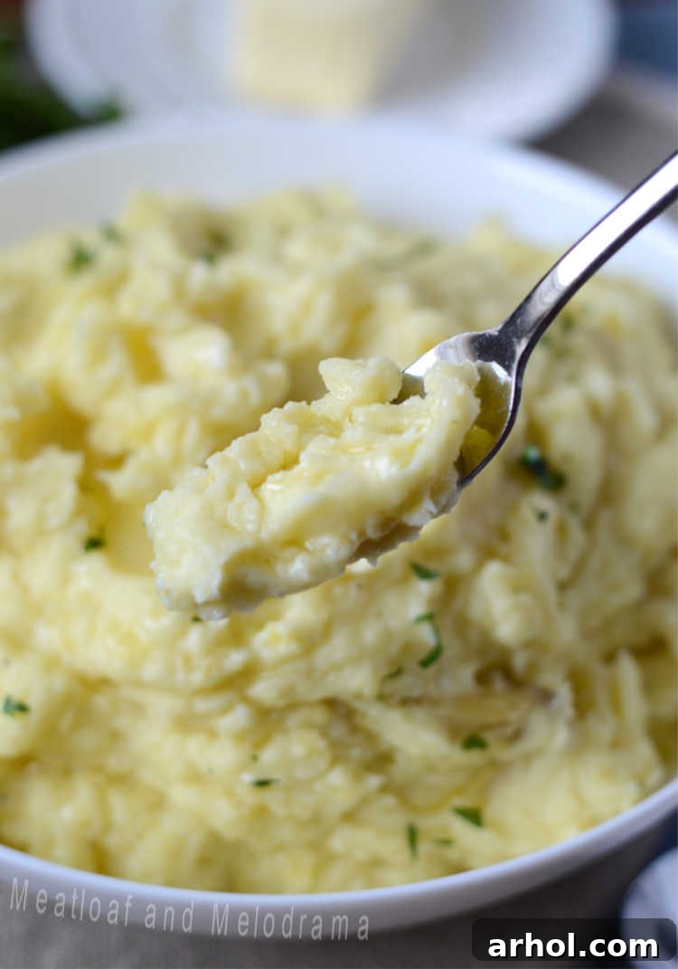 Creamy Instant Pot mashed potatoes on a fork