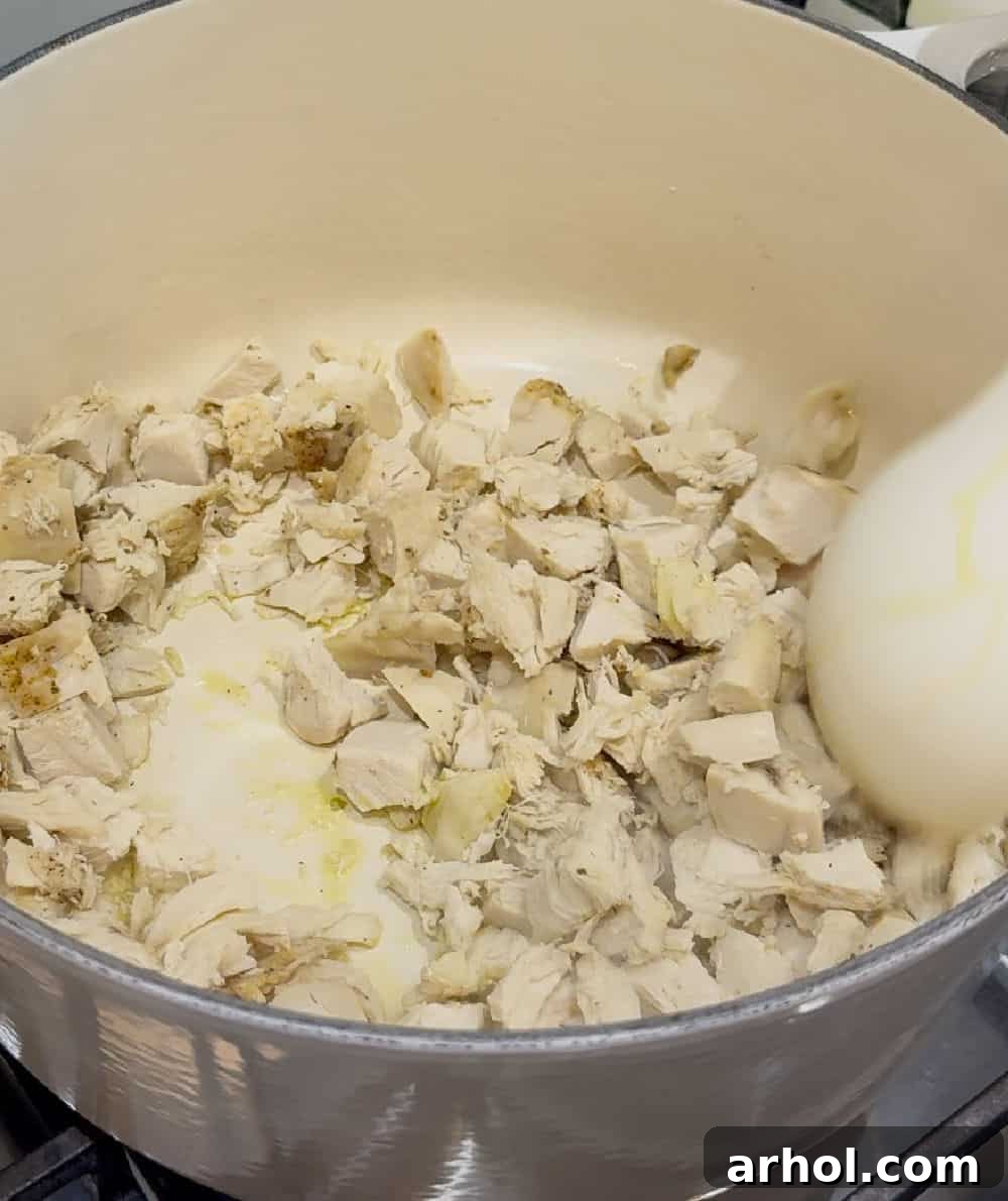 One-Pan Turkey Noodle Bliss 4 heat turkey in dutch oven.