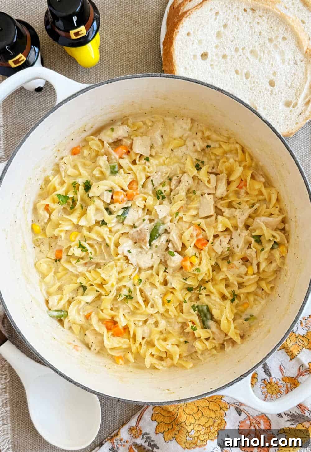 One-Pan Turkey Noodle Bliss 8 turkey casserole with egg noodles in dutch oven.