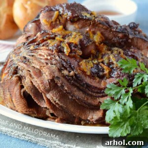 Instant Pot Ham with Cranberry Orange Glaze on a white platter