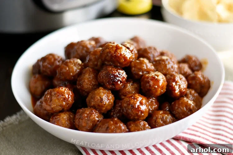 Instant Pot Grape Jelly Meatballs with sweet chili sauce in serving bowl, ready to be enjoyed as a quick appetizer