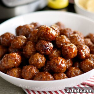 Instant Pot Grape Jelly Meatballs with sweet chili sauce in serving bowl