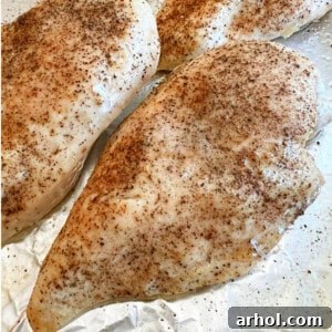 Baked chicken breasts with simple seasoning.