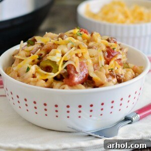 instant pot macaroni beef casserole with cheese in white bowl