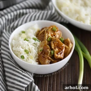Instant Pot Teriyaki Chicken in a bowl with rice, ready to eat.