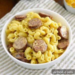 A bowl of Instant Pot Kielbasa Mac and Cheese, a hearty and cheesy pasta dish.
