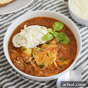 A bowl of Instant Pot Lasagna Soup, rich with pasta, meat, and cheese.