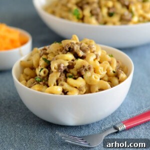 Instant Pot Cheeseburger Macaroni served in white bowls, ready to eat.
