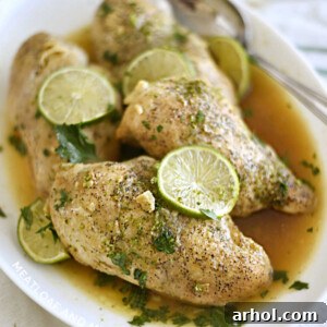 instant pot honey lime chicken breasts on white platter with lime slices