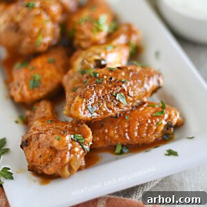air fryer buffalo chicken wings on a white platter