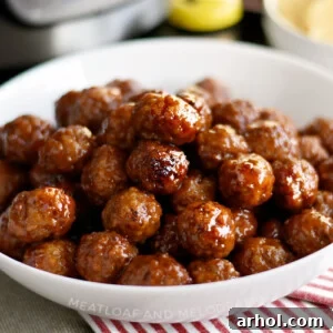 instant pot grape jelly meatballs with sweet chili sauce in serving bowl
