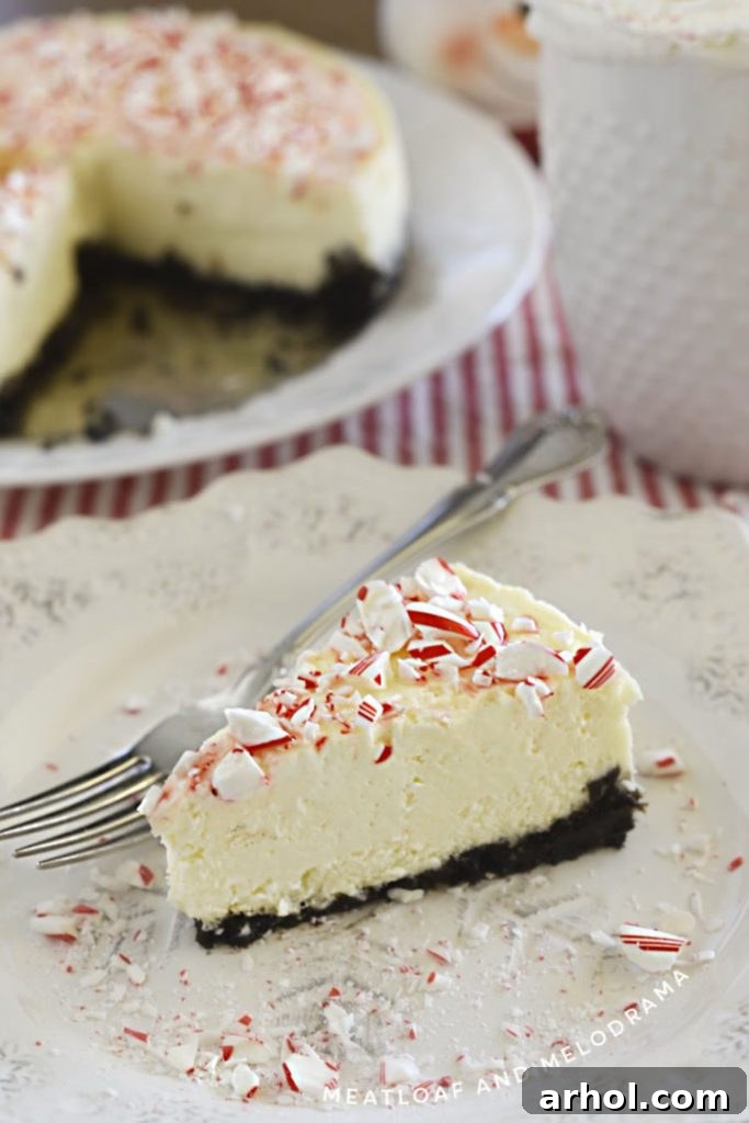 pressure cooker peppermint cheesecake with candy cane topping on plate