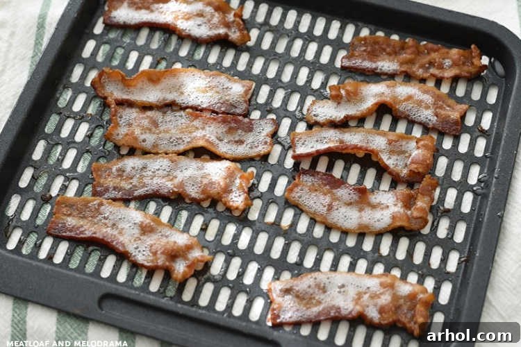 crispy cooked bacon on air fryer tray