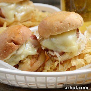 Kielbasa sauerkraut sliders in basked with chips