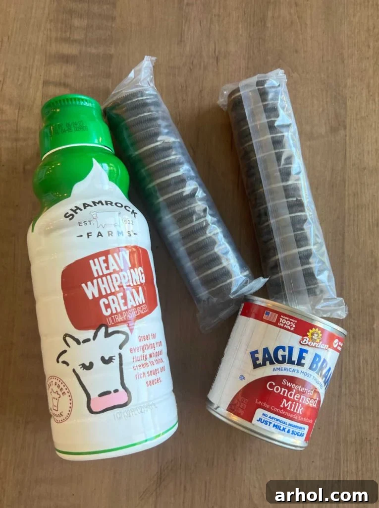 The three essential ingredients for no-churn Oreo ice cream: heavy whipping cream, sweetened condensed milk, and Oreo cookies.