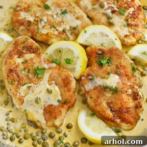 Lemon chicken piccata in creamy lemon butter sauce with white wine and capers