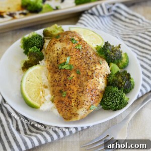 baked honey lime chicken with broccoli and rice on a plate