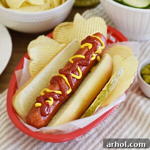 air fried hot dog in a bun with ketchup and mustard