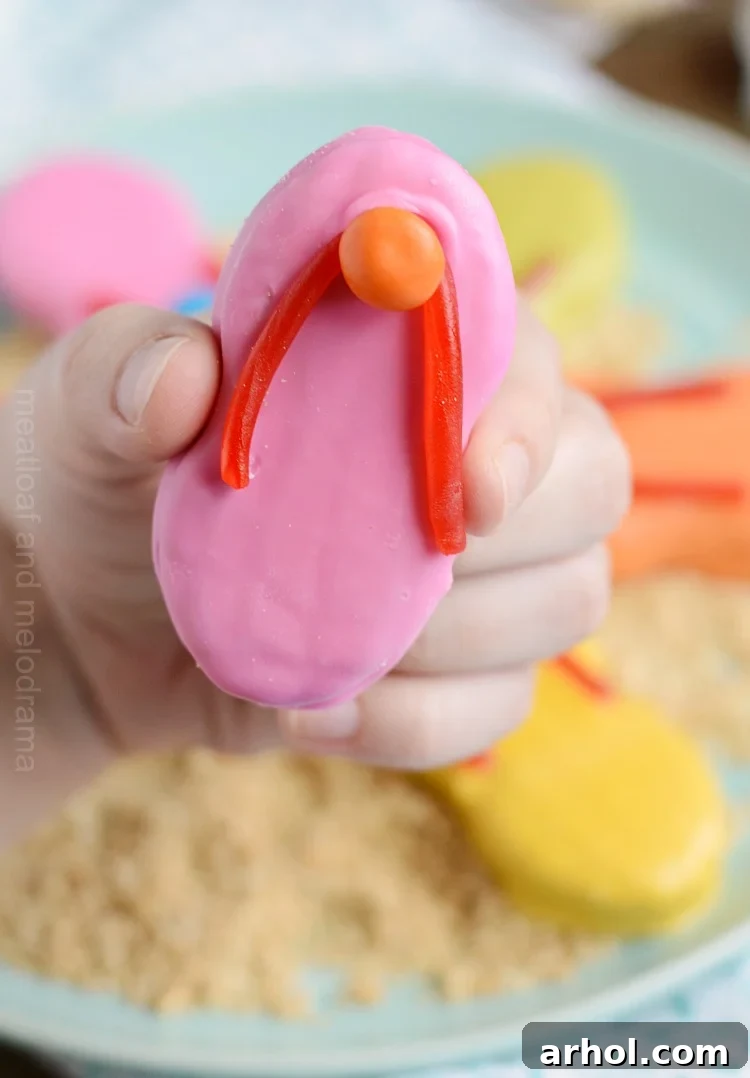 easy flip flop cookies in hand, showcasing the finished product.