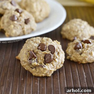 Easy Banana Oatmeal Cookies with chocolate chips displayed on a table