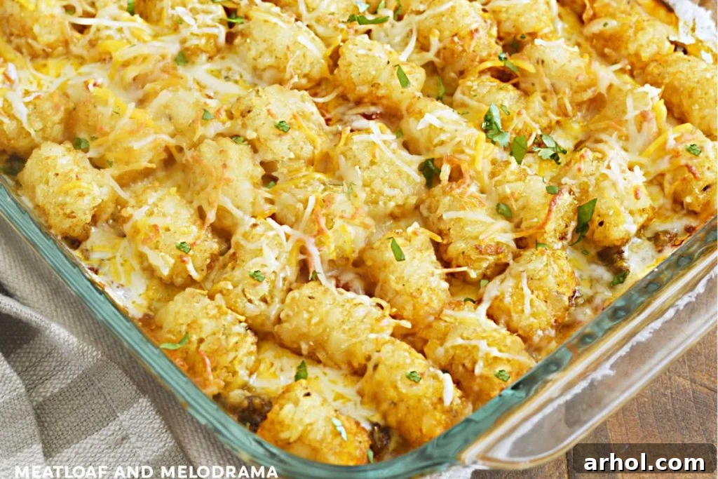 taco tater tot casserole with cilantro in a baking dish