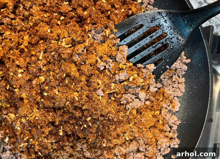ground beef with taco seasoning in skillet