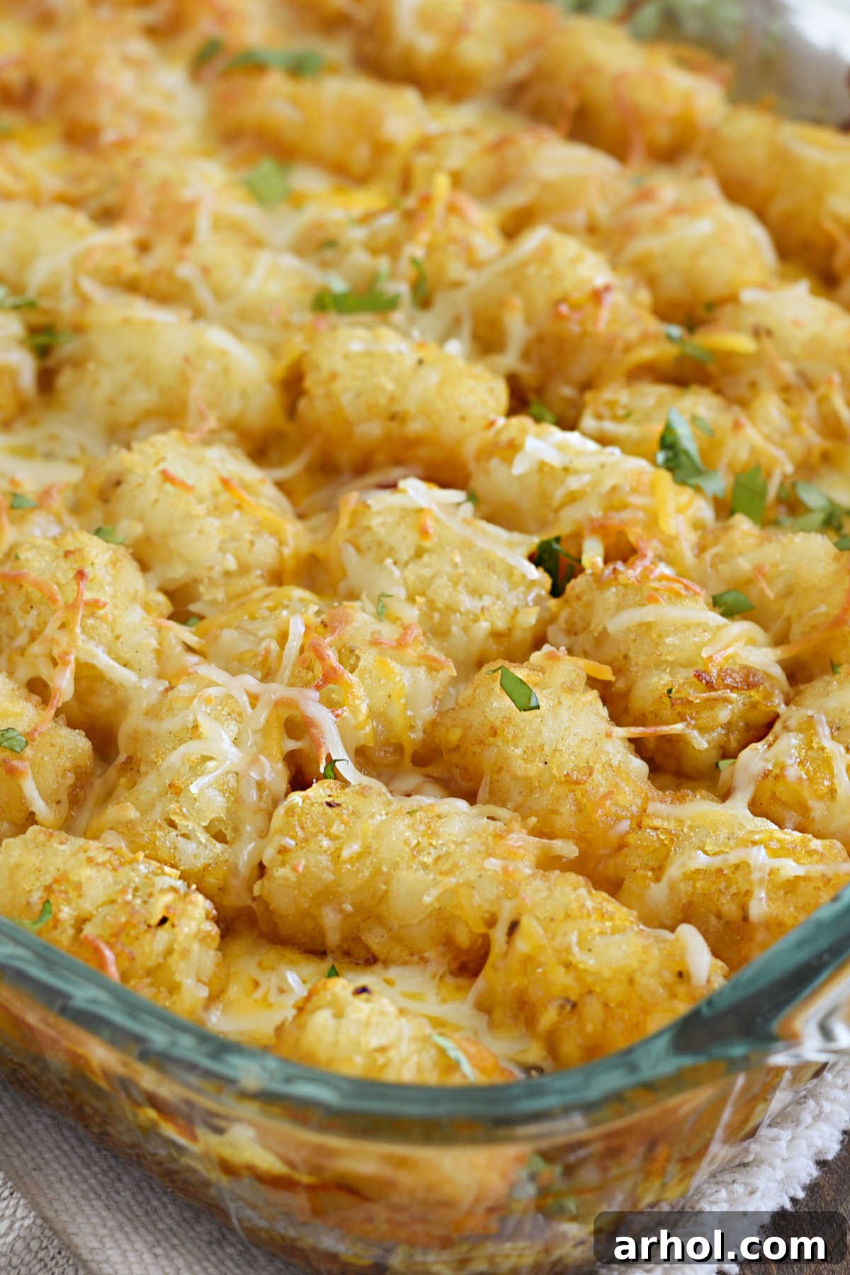 close up of taco tater tot casserole with cheese