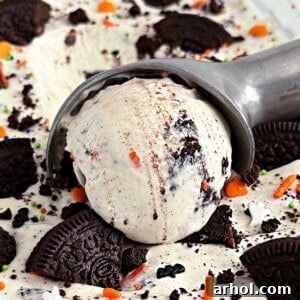 Homemade Halloween ice cream, or 'Cookies and Scream,' with crushed Oreos in a scoop.