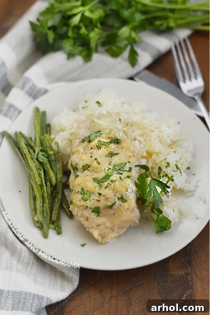 pork chop with green beans and jasmine rice on a plate
