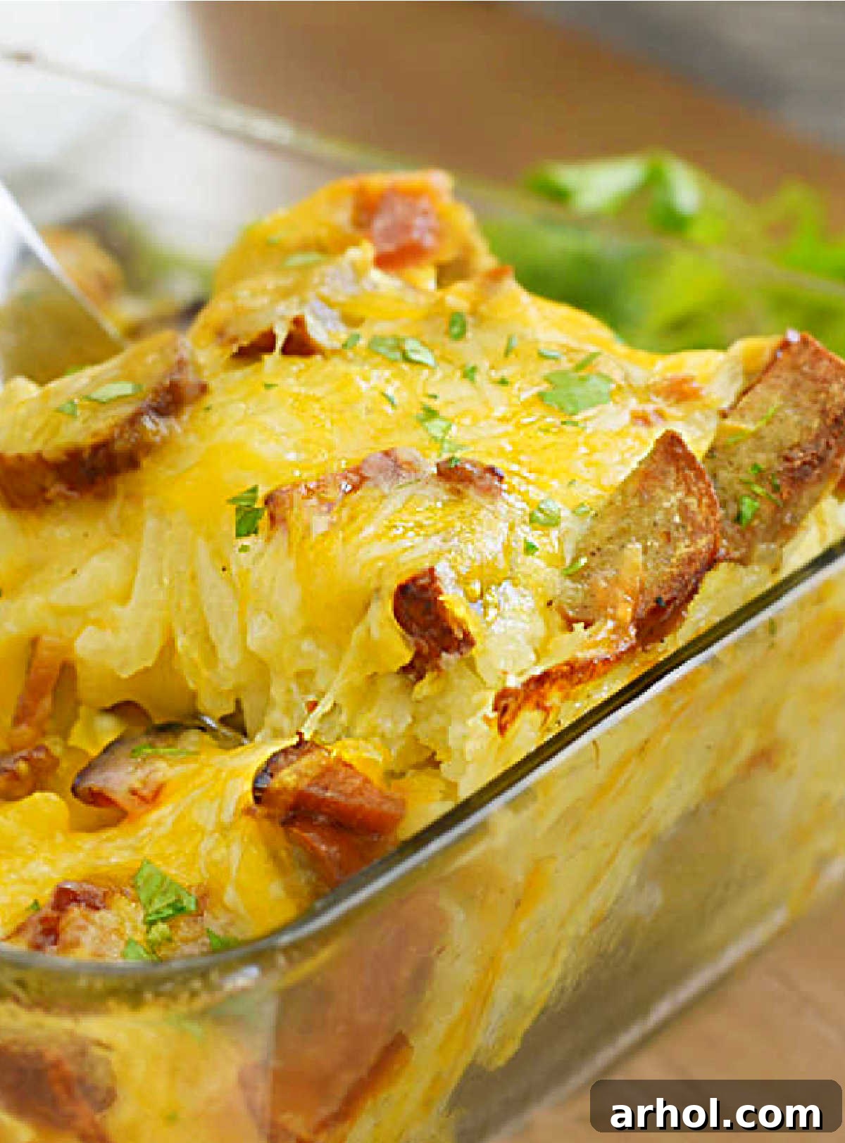 cheesy hashbrown breakfast casserole made with hash brown potatoes and breakfast sausage