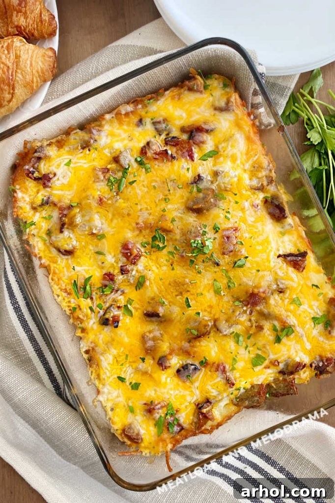 overhead view of baked sausage egg hashbrown potato casserole