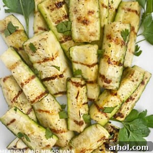 Grilled zucchini with fresh parsley garnish