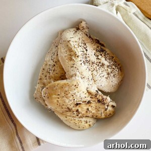 instant pot frozen chicken breasts cooked in white bowl
