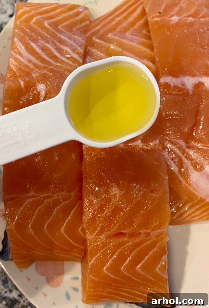 pour avocado oil on salmon