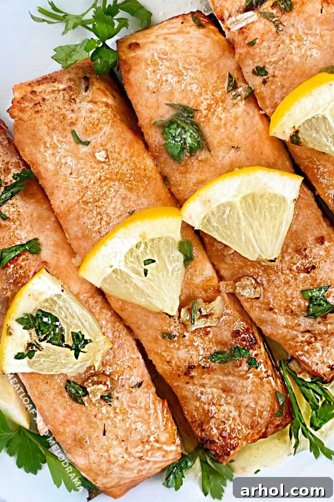 overhead view of grilled lemon garlic salmon with parsley